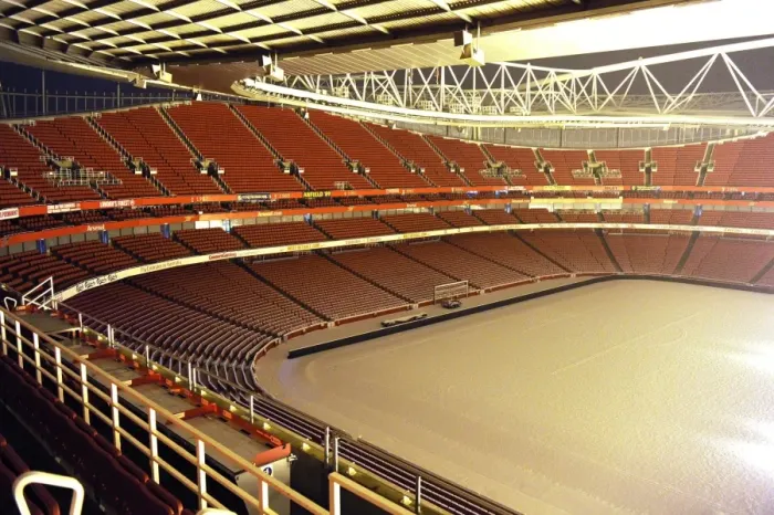 Framed Print : Winter's Grip: Arsenal's Emirates Stadium Blanketed in Snow