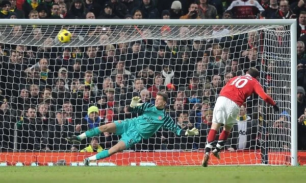 Wojciech Szczesny (Arsenal) looks on as Wayne Rooneys penalty saile over the crossbar