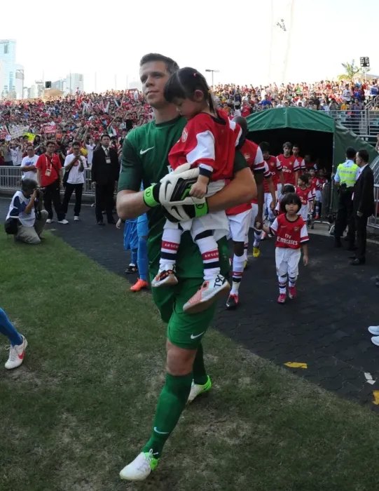 Framed Print : Wojciech Szczesny Escorts Player onto Pitch before Arsenal's Kitchee FC Match (2012-13)