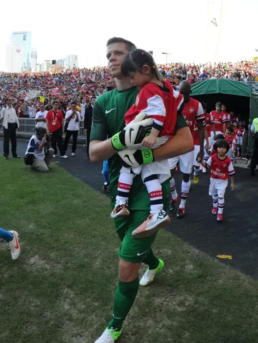 Framed Print : Wojciech Szczesny Escorts Player onto Pitch before Kitchee FC vs Arsenal FC (2012)
