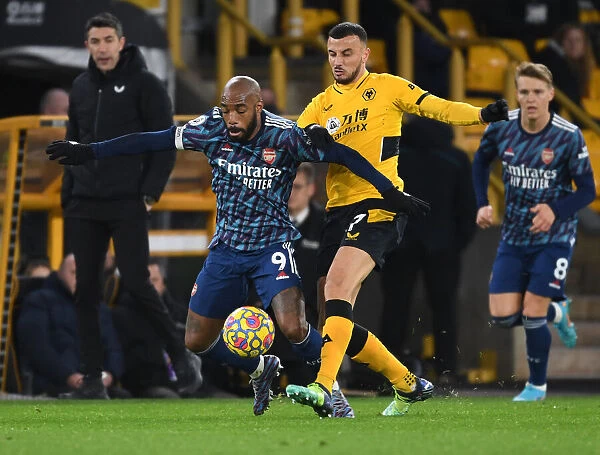 Wolverhampton Wanderers vs. Arsenal: Lacazette Tripped by Saiss in Intense Premier League Clash
