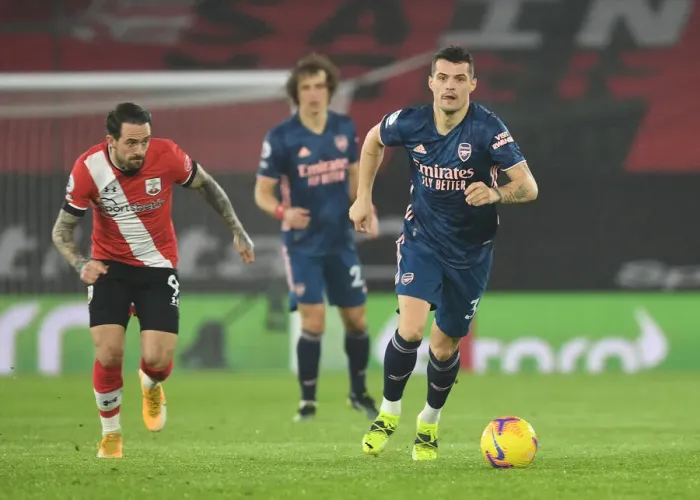 Framed Print : Xhaka Breaks Past Ings: Southampton vs Arsenal, Premier League 2021 (Behind Closed Doors) Framed Print : Xhaka Breaks Past Ings: Southampton vs Arsenal, Premier League 2021 (Behind Closed Doors)