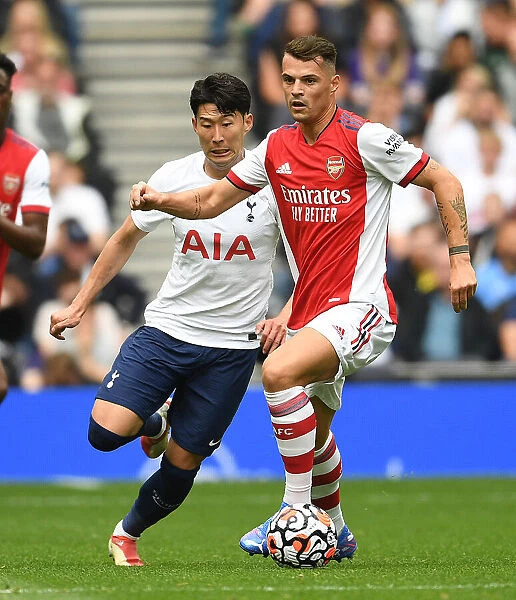 Xhaka Breaks Past Son: Arsenal vs. Tottenham Pre-Season Clash