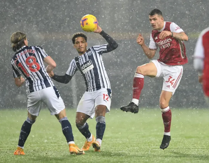 Framed Print : Xhaka Faces Off Against Diangana and Gallagher in Intense West Bromwich Albion vs Arsenal Clash