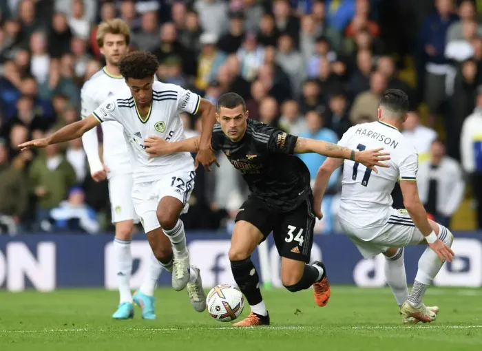 Framed Print : Xhaka Faces Off Against Leeds Duo in Intense Arsenal-Leeds Clash (2022-23 Premier League)
