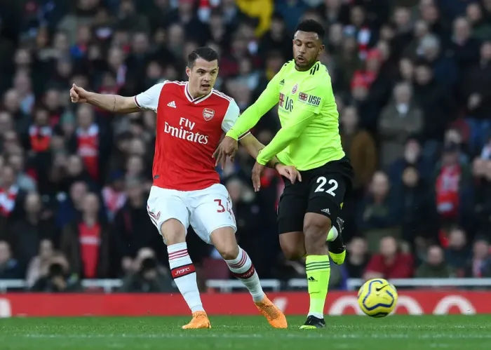 Framed Print : Xhaka Under Fire: Intense Pressure from Mousset in Arsenal vs. Sheffield United Clash Framed Print : Xhaka Under Fire: Intense Pressure from Mousset in Arsenal vs. Sheffield United Clash