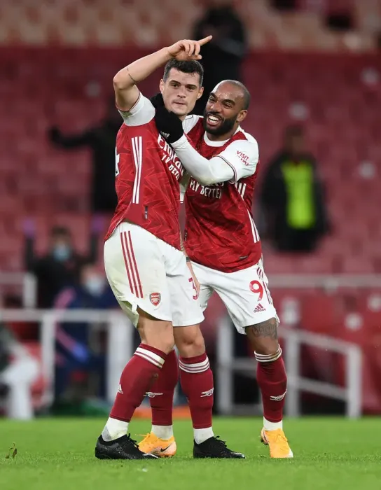 Framed Print : Xhaka and Lacazette Celebrate Arsenal's Victory Goals Against Chelsea (2020-21) Framed Print : Xhaka and Lacazette Celebrate Arsenal's Victory Goals Against Chelsea (2020-21)