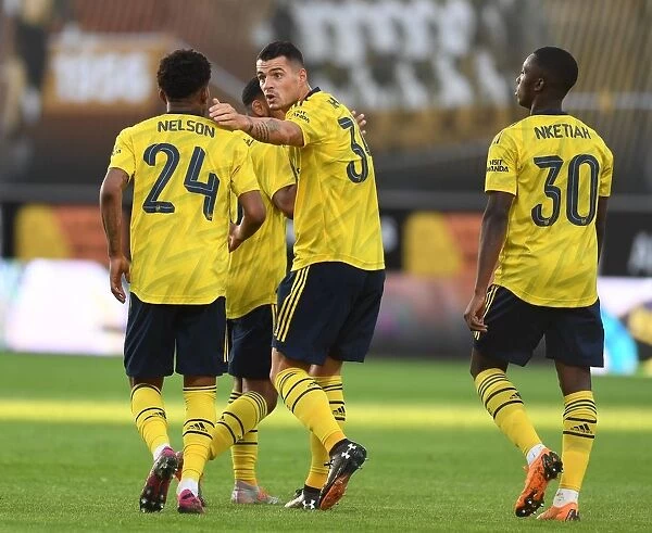 Xhaka and Nelson Celebrate Goal: Arsenal's Pre-Season Victory in Angers