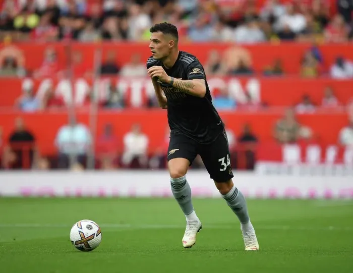 Framed Print : Xhaka at Old Trafford: Arsenal vs. Manchester United, Premier League 2022-23 Framed Print : Xhaka at Old Trafford: Arsenal vs. Manchester United, Premier League 2022-23