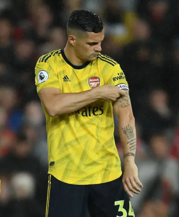 Framed Print : Xhaka at Old Trafford: Battle of Manchester United vs. Arsenal in Premier League 2019-20