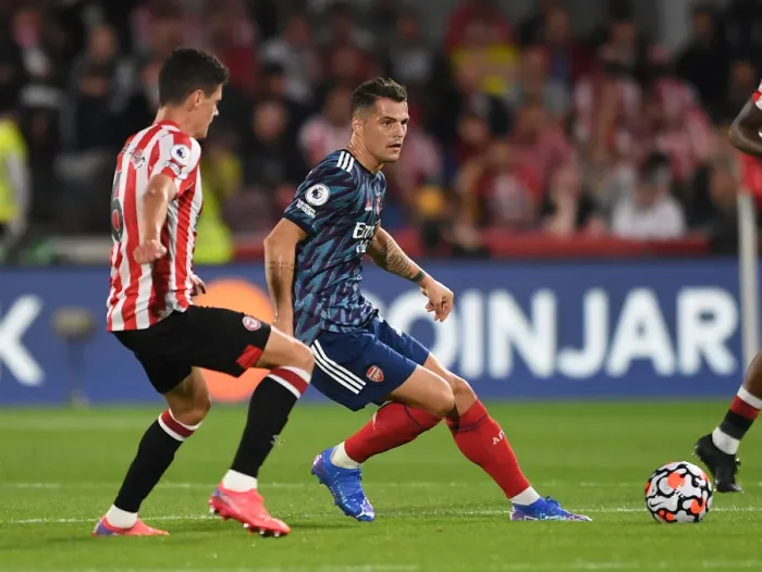 Framed Print : Xhaka Under Pressure: Brentford vs. Arsenal, Premier League 2021-22