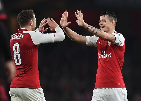 Xhaka and Ramsey's Europa League Goals: Arsenal's Double Strike Against AC Milan