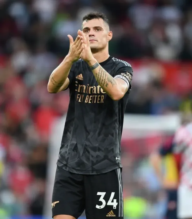 Framed Print : Xhaka Salutes Arsenal Fans: Manchester United vs Arsenal FC - Premier League 2022-23 Framed Print : Xhaka Salutes Arsenal Fans: Manchester United vs Arsenal FC - Premier League 2022-23