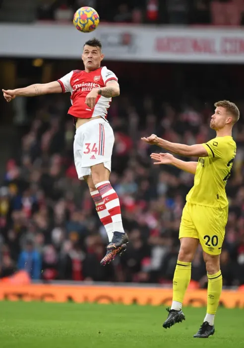 Framed Print : Xhaka Soaring High: Arsenal vs. Brentford, Premier League 2021-22 Framed Print : Xhaka Soaring High: Arsenal vs. Brentford, Premier League 2021-22