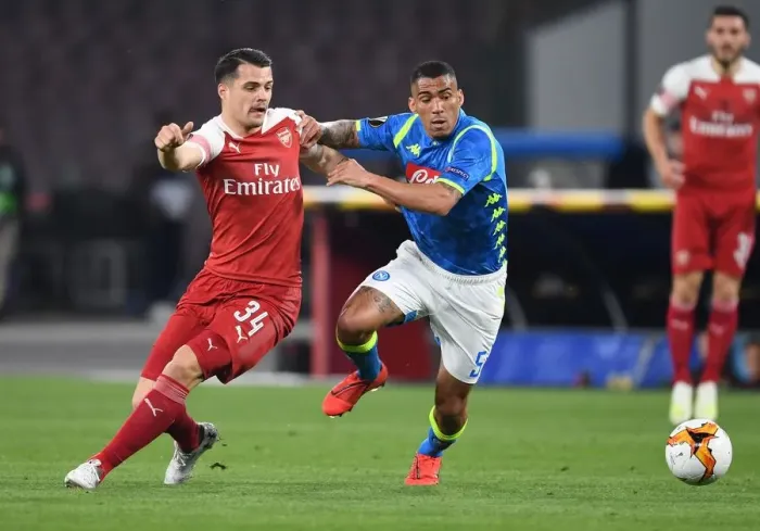 Framed Print : Xhaka vs Allan: A Fierce Battle in the Europa League Showdown between Napoli and Arsenal, 2019