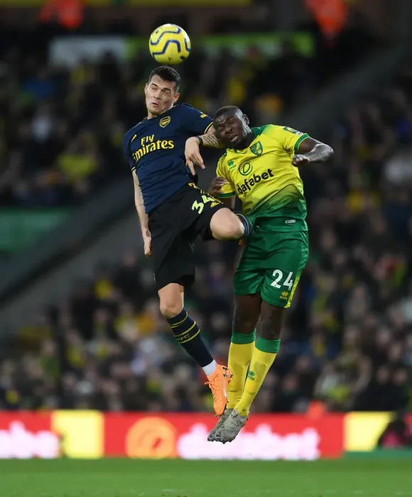 Framed Print : Xhaka vs Amadou: Battle for Supremacy in Norwich City vs Arsenal FC Premier League Clash