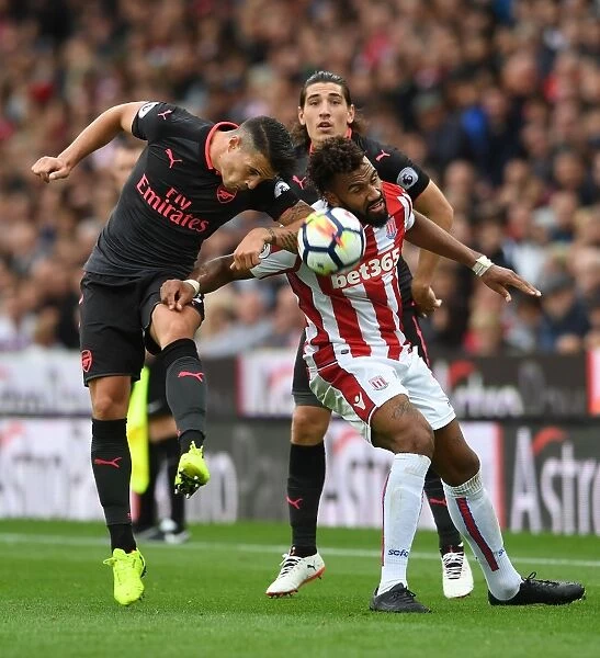 Xhaka vs. Choupo-Moting: Intense Battle in Stoke City vs. Arsenal Premier League Clash