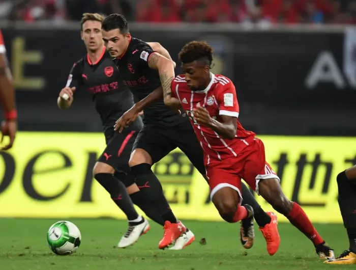 Framed Print : Xhaka vs Coman: Battle in Shanghai - Bayern Munich vs Arsenal Pre-Season Clash