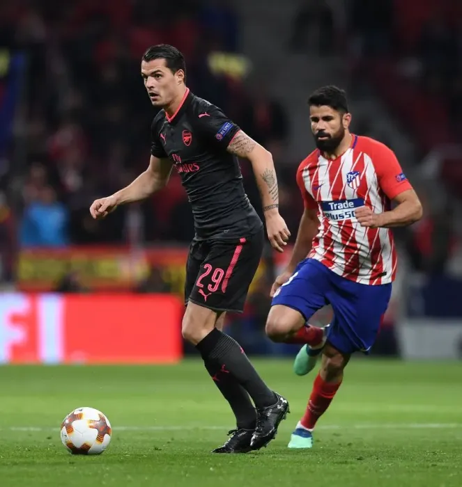 Framed Print : Xhaka vs Costa: Battle in the Europa League Semi-Final