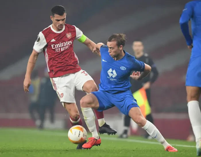 Framed Print : Xhaka vs Ellingsen: Battle in the Europa League - Arsenal vs Molde
