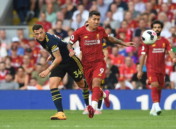 Xhaka vs Firmino: Intense Clash Between Liverpool and Arsenal in Premier League