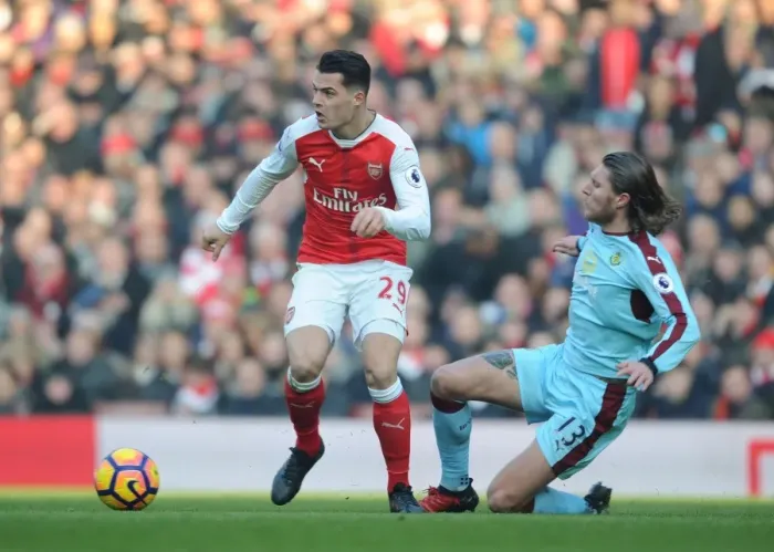 Framed Print : Xhaka vs Hendrick: A Premier League Battle at Emirates Stadium
