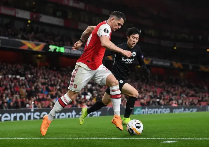 Framed Print : Xhaka vs Kamada: Europa League Showdown - Arsenal vs Eintracht Frankfurt