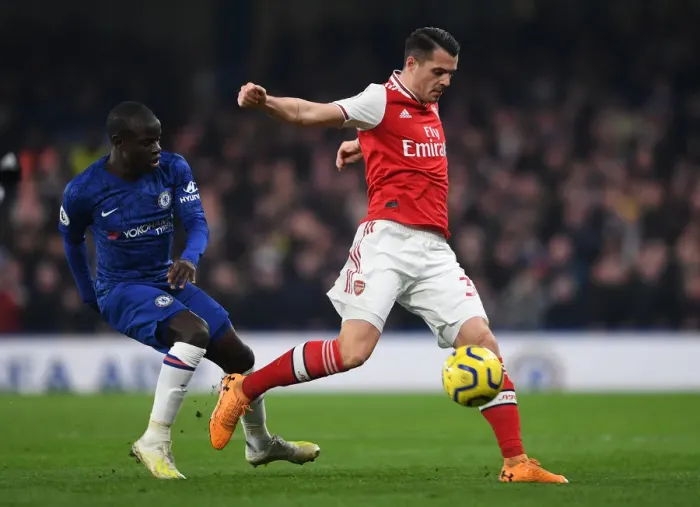Framed Print : Xhaka vs Kante: Intense Battle in Chelsea vs Arsenal Premier League Clash Framed Print : Xhaka vs Kante: Intense Battle in Chelsea vs Arsenal Premier League Clash