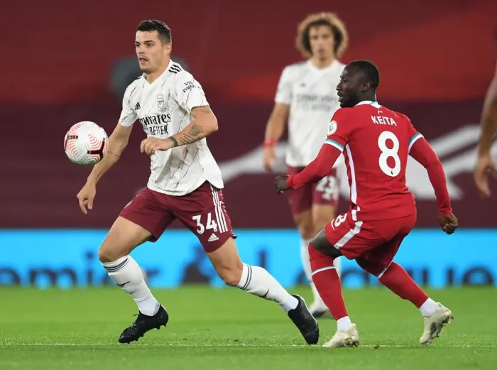 Framed Print : Xhaka vs. Keita: Liverpool vs. Arsenal Clash in Empty Anfield, Premier League 2020-21 Framed Print : Xhaka vs. Keita: Liverpool vs. Arsenal Clash in Empty Anfield, Premier League 2020-21