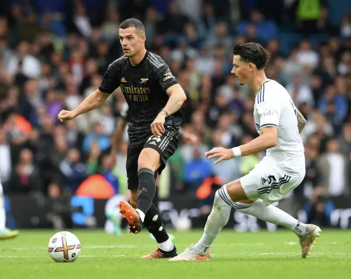 Framed Print : Xhaka vs Koch: Intense Battle in Leeds United vs Arsenal FC Premier League Clash Framed Print : Xhaka vs Koch: Intense Battle in Leeds United vs Arsenal FC Premier League Clash