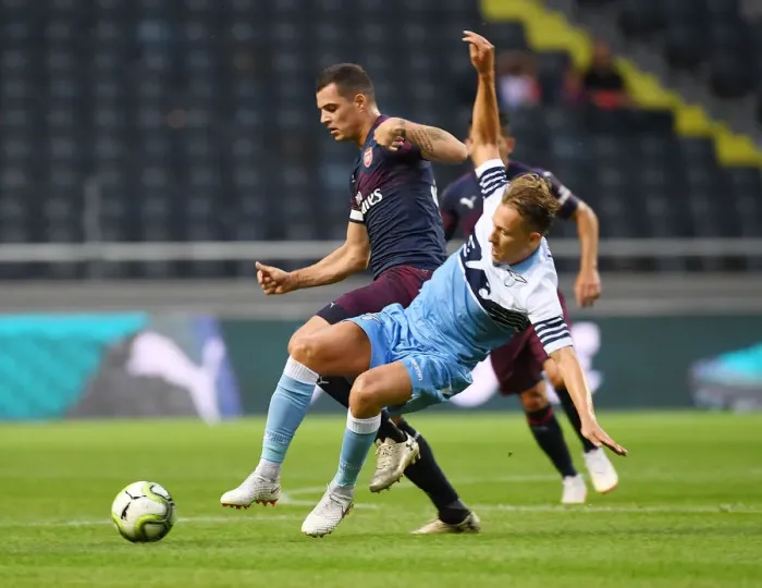 Framed Print : Xhaka vs. Levia: Clash in the Pre-Season Friendly between Arsenal and SS Lazio Framed Print : Xhaka vs. Levia: Clash in the Pre-Season Friendly between Arsenal and SS Lazio