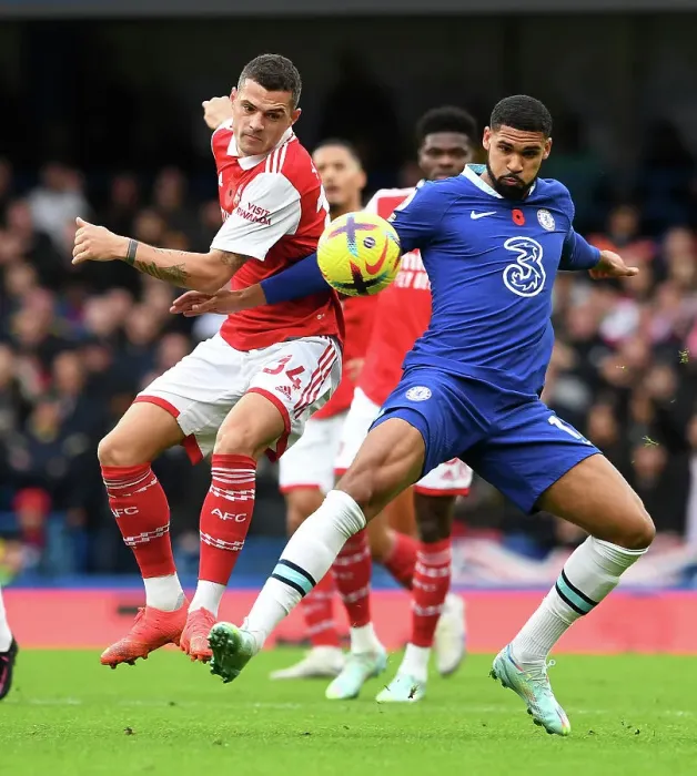 Framed Print : Xhaka vs. Loftus-Cheek: Battle in the Heart of the Premier League Clash Between Chelsea and Arsenal Framed Print : Xhaka vs. Loftus-Cheek: Battle in the Heart of the Premier League Clash Between Chelsea and Arsenal