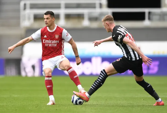 Framed Print : Xhaka vs Longstaff: A Battle in Empty St. James Park - Newcastle United vs Arsenal, Premier League 2021 Framed Print : Xhaka vs Longstaff: A Battle in Empty St. James Park - Newcastle United vs Arsenal, Premier League 2021