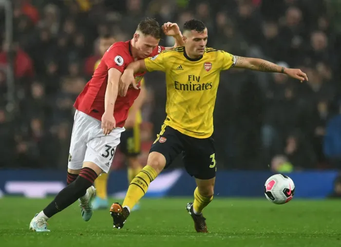 Framed Print : Xhaka vs. McTominay: Clash of the Midfield Titans - Manchester United vs. Arsenal, Premier League 2019-20 Framed Print : Xhaka vs. McTominay: Clash of the Midfield Titans - Manchester United vs. Arsenal, Premier League 2019-20
