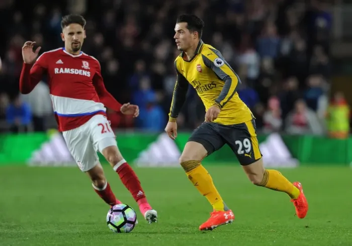Framed Print : Xhaka vs. Ramirez: Intense Battle in Middlesbrough vs. Arsenal Premier League Clash Framed Print : Xhaka vs. Ramirez: Intense Battle in Middlesbrough vs. Arsenal Premier League Clash