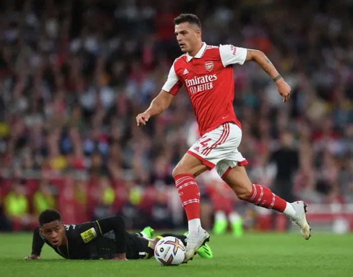 Framed Print : Xhaka vs. Ramsey: A Midfield Battle Royale in Arsenal's 2022-23 Premier League Clash with Aston Villa