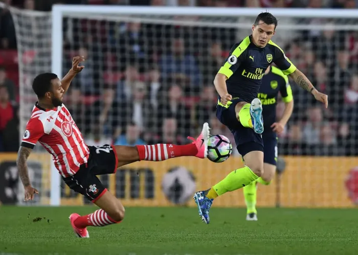 Framed Print : Xhaka vs. Redmond: Intense Clash Between Southampton and Arsenal Players