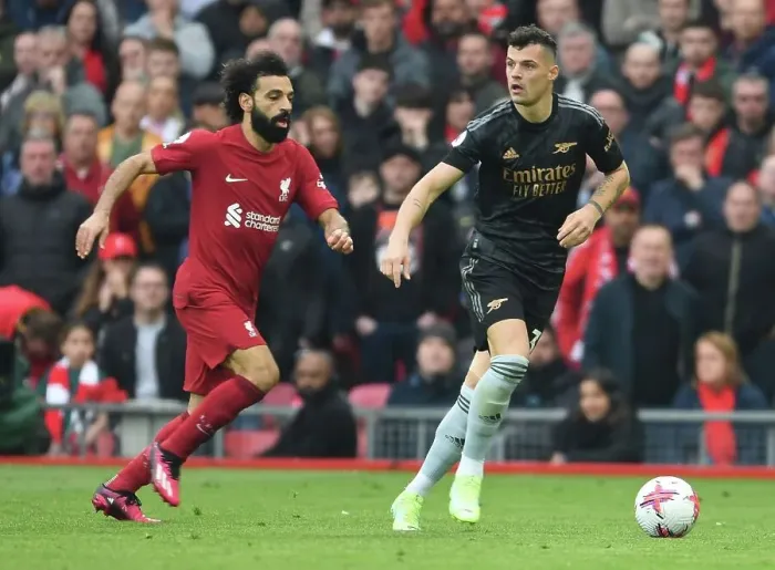 Framed Print : Xhaka vs Salah: Intense Battle at Anfield - Liverpool vs Arsenal, Premier League 2022-23