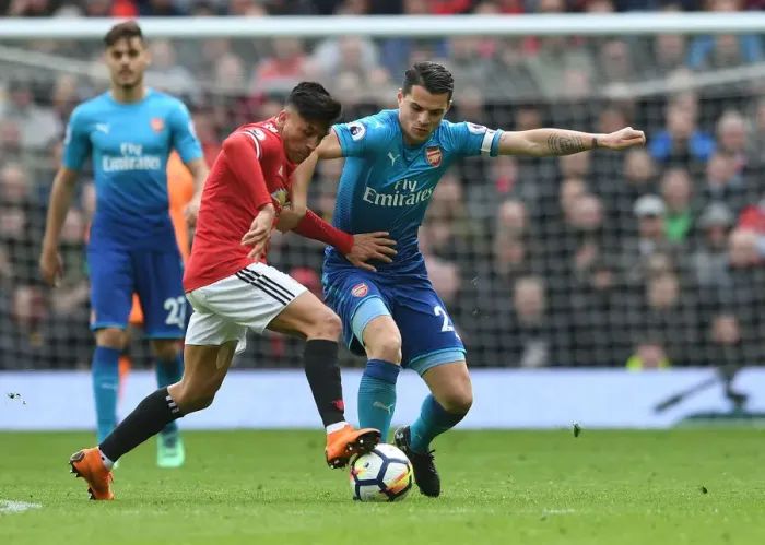 Framed Print : Xhaka vs. Sanchez: Clash of the Former Gunners in Manchester United vs. Arsenal Premier League Clash Framed Print : Xhaka vs. Sanchez: Clash of the Former Gunners in Manchester United vs. Arsenal Premier League Clash
