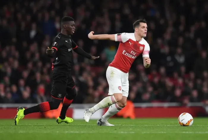 Framed Print : Xhaka vs Sarr: Battle in the Europa League as Arsenal Face Stade Rennais Framed Print : Xhaka vs Sarr: Battle in the Europa League as Arsenal Face Stade Rennais