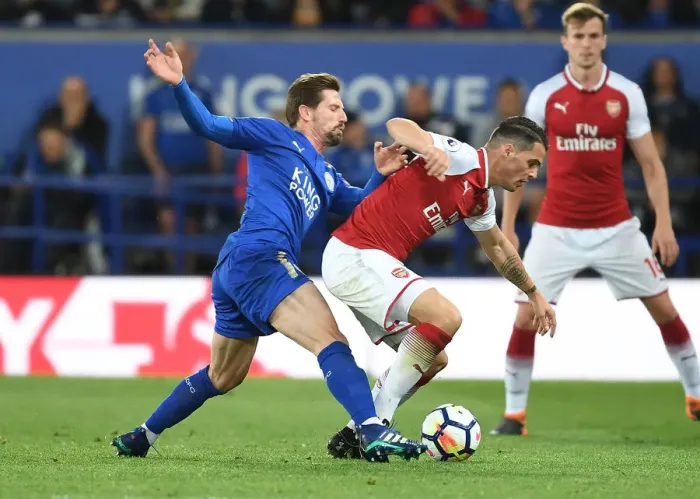 Framed Print : Xhaka vs Silva: A Premier League Battle at The King Power Stadium