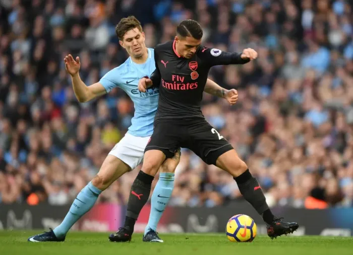 Framed Print : Xhaka vs Stones: Battle in the Midfield - Manchester City vs Arsenal, Premier League 2017-18