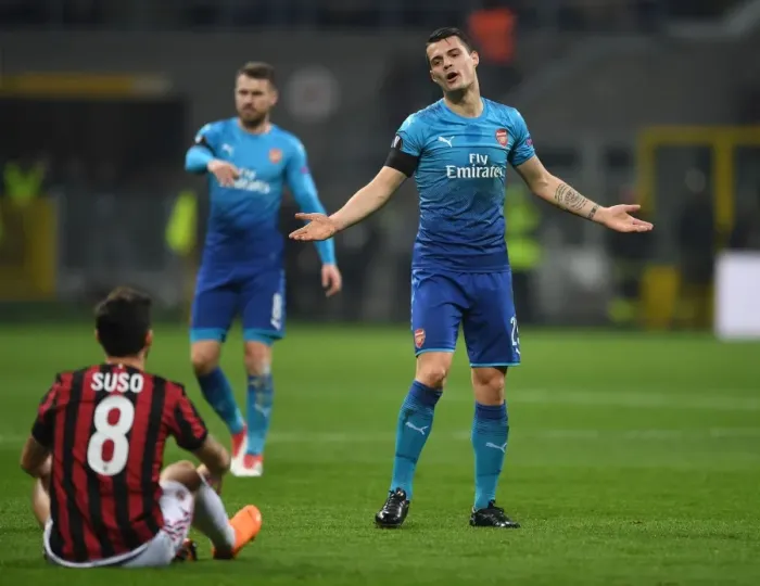 Framed Print : Xhaka vs. Suso: Intense Rivalry in Arsenal's Europa League Clash with AC Milan Framed Print : Xhaka vs. Suso: Intense Rivalry in Arsenal's Europa League Clash with AC Milan
