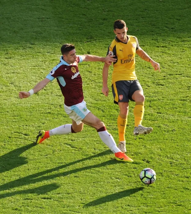Framed Print : Xhaka vs Ward: A Football Battle at Turf Moor Framed Print : Xhaka vs Ward: A Football Battle at Turf Moor