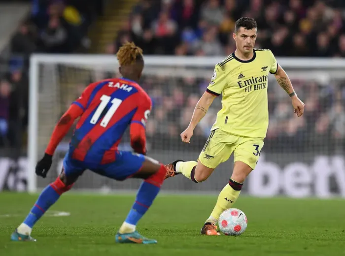 Framed Print : Xhaka vs Zaha: Battle at Selhurst Park - Crystal Palace vs Arsenal, Premier League 2021-22