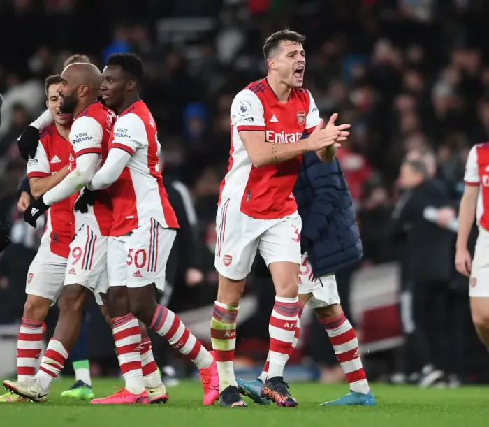Framed Print : Xhaka's Euphoric Celebration: Arsenal Secures Premier League Victory over Wolverhampton Wanderers
