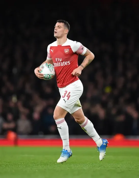 Framed Print : Xhaka's Midfield Battle: Arsenal vs. Tottenham in the Carabao Cup Quarterfinals