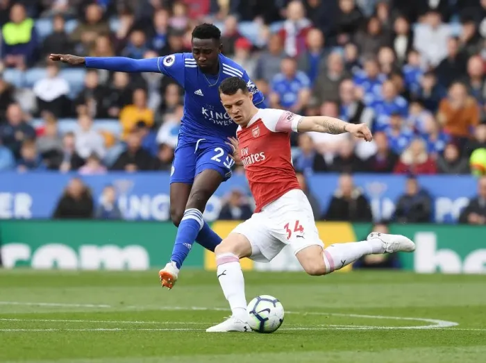 Framed Print : Xhaka's Powerful Overtake: Arsenal's Thrilling Victory over Leicester City (2018-19)