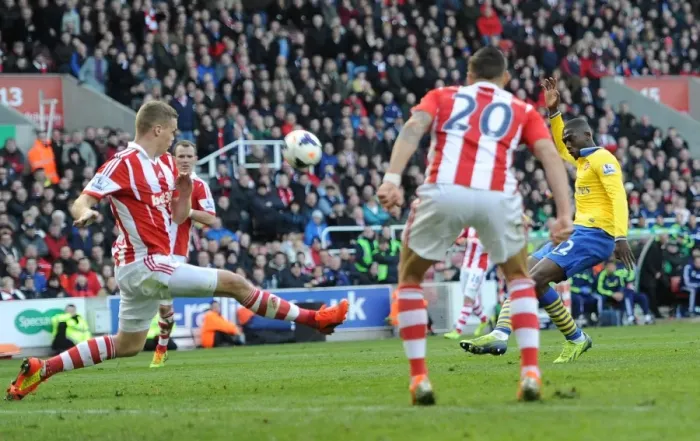 Framed Print : Yaya Sanogo (Arsenal) Ryan Shawcross (Stoke). Stoke City 1: 0 Arsenal. Barclays Premier League