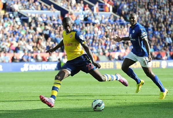 Yaya Sanogo (Arsenal) Wes Morgan (Leicester). Leicester City 1:1 Arsenal. Barclays Premier League